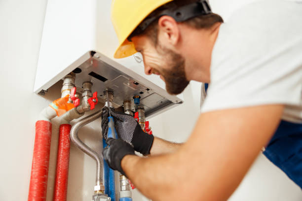 technician working on heating system installation